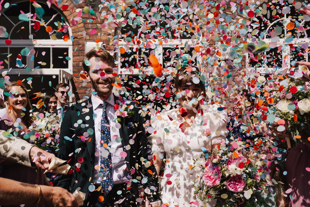 colourful explosion of confetti | Contemporary Wedding Photography